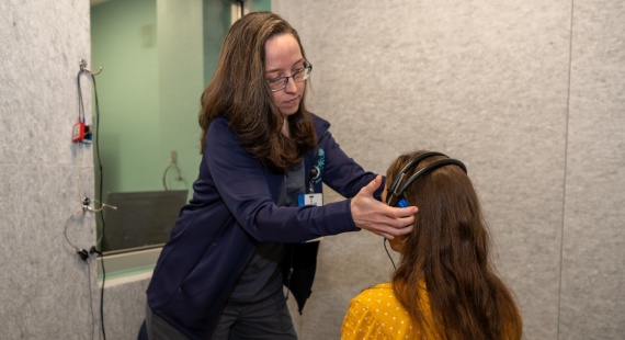 Dr. Suzanne Yoder working with patient